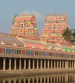Vaitheeswaran Koil temple gopuram with the temple tank